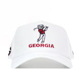 The No Rivals Georgia Bulldogs Golf Hat in white features an embroidered bulldog swinging a golf club above red "GEORGIA" text, a side circular logo, and a structured snapback fit in a comfortable polyester-cotton blend.