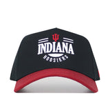The No Rivals Indiana Tailgate Hat is a black snapback with a red brim, featuring the Indiana Hoosiers and IU logo in white and red embroidery on the front. Made from high quality cotton for a structured fit.
