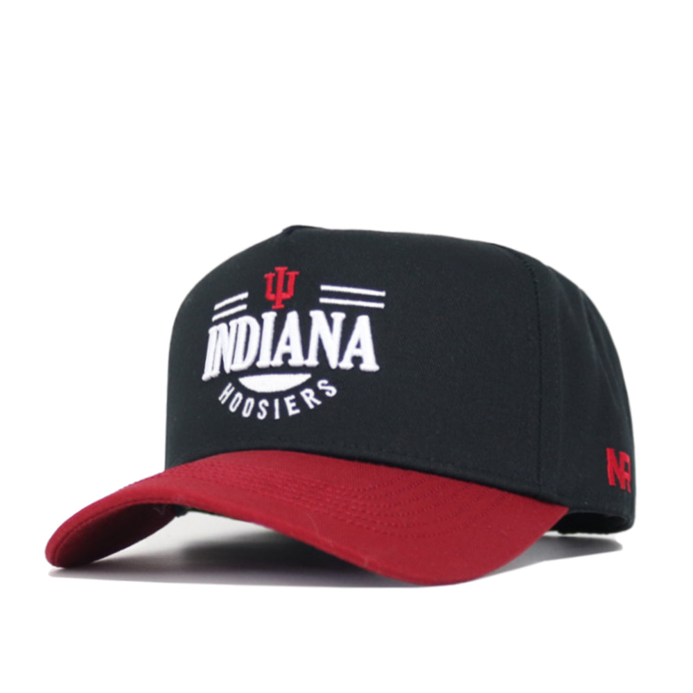 The No Rivals Indiana Tailgate Hat is a black snapback with a red brim, featuring Indiana Hoosiers and the IU logo embroidered in white and red on the front. Made from high-quality cotton for a comfortable, structured fit.