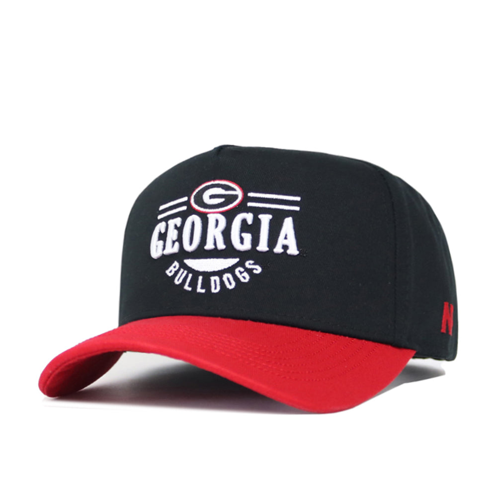 The No Rivals Georgia Tailgate Hat is a black snapback with a red brim, featuring "Georgia Bulldogs" and the University of Georgia G logo embroidered on the front. Made from high-quality cotton for a structured, comfortable fit.