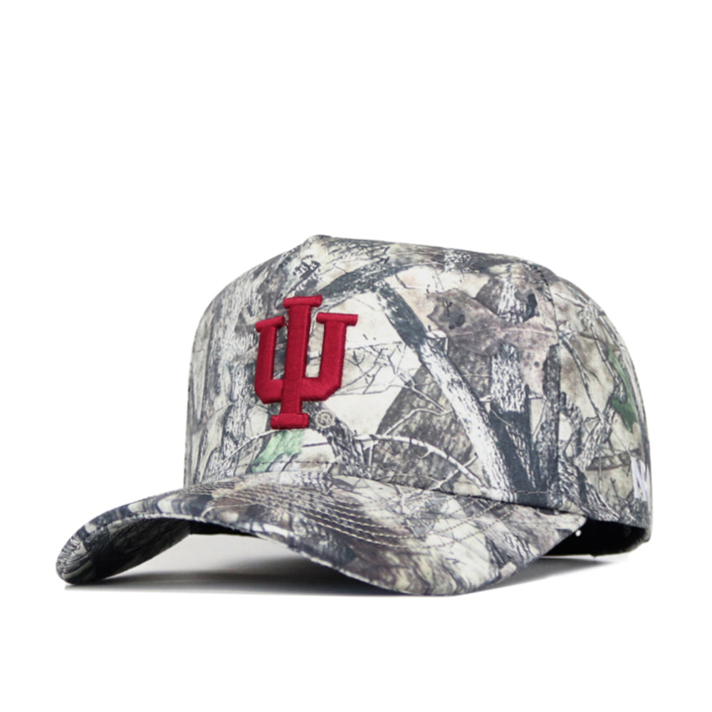 The No Rivals Indiana Outland Hat is a high-quality cotton camouflage baseball cap with a curved brim, structured fit, woodland pattern, and red Indiana University logo on the front.