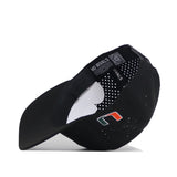 The Miami Golf Hat - Black by No Rivals features a small multicolored U logo embroidered on the front, perforated back panels, and an inner band with "NO RIVALS" text and a visible QR code.