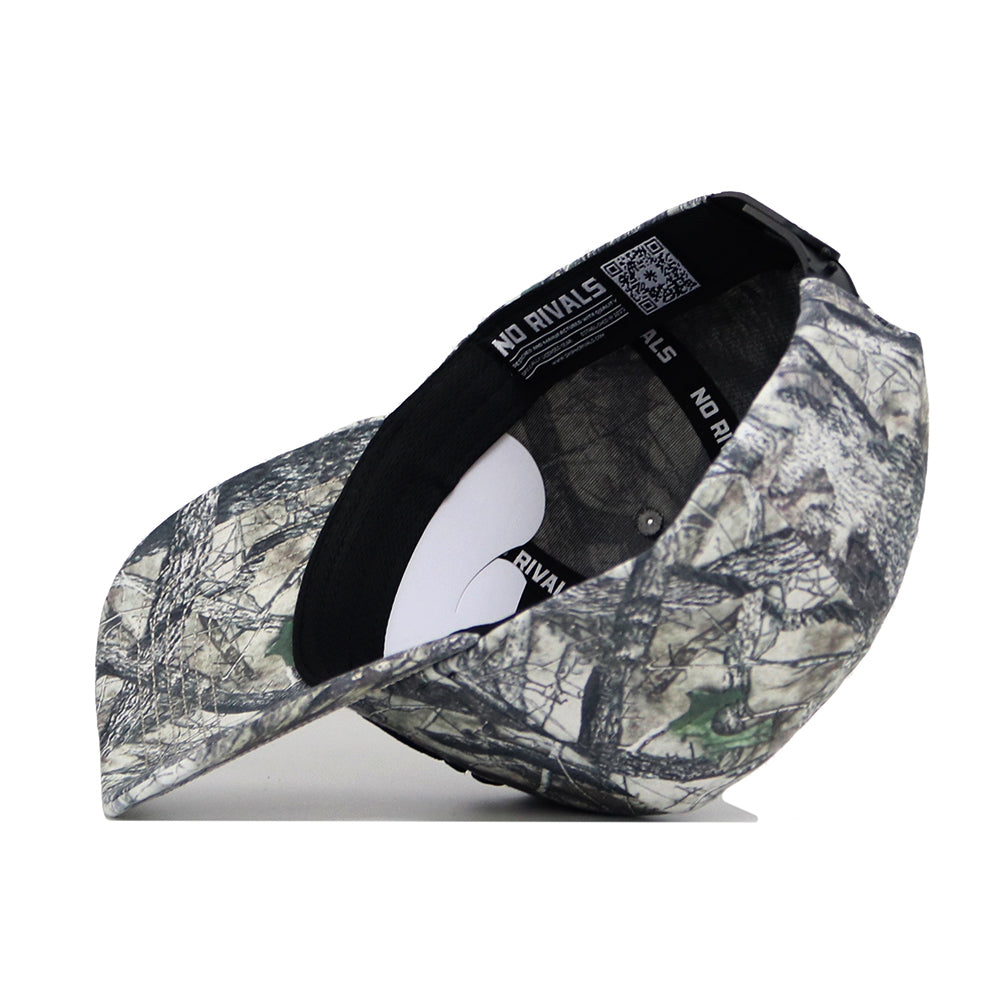 The South Carolina Outland Hat by No Rivals is shown at an angled side view, featuring a structured brim, inside lining with black piping, an adjustable snapback strap, and an interior “NO RIVALS” label.