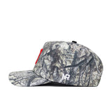 The No Rivals Nebraska Outland Hat is a high-quality cotton snapback featuring a camouflage pattern, red embroidered letter front, white NR logo on the side, shown left profile against a white background.