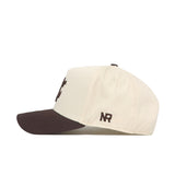 The No Rivals Washington State Espresso Hat features a cream-colored crown, dark brown brim, and brown embroidered NR initials on the side—making it the perfect gameday accessory for any fan.