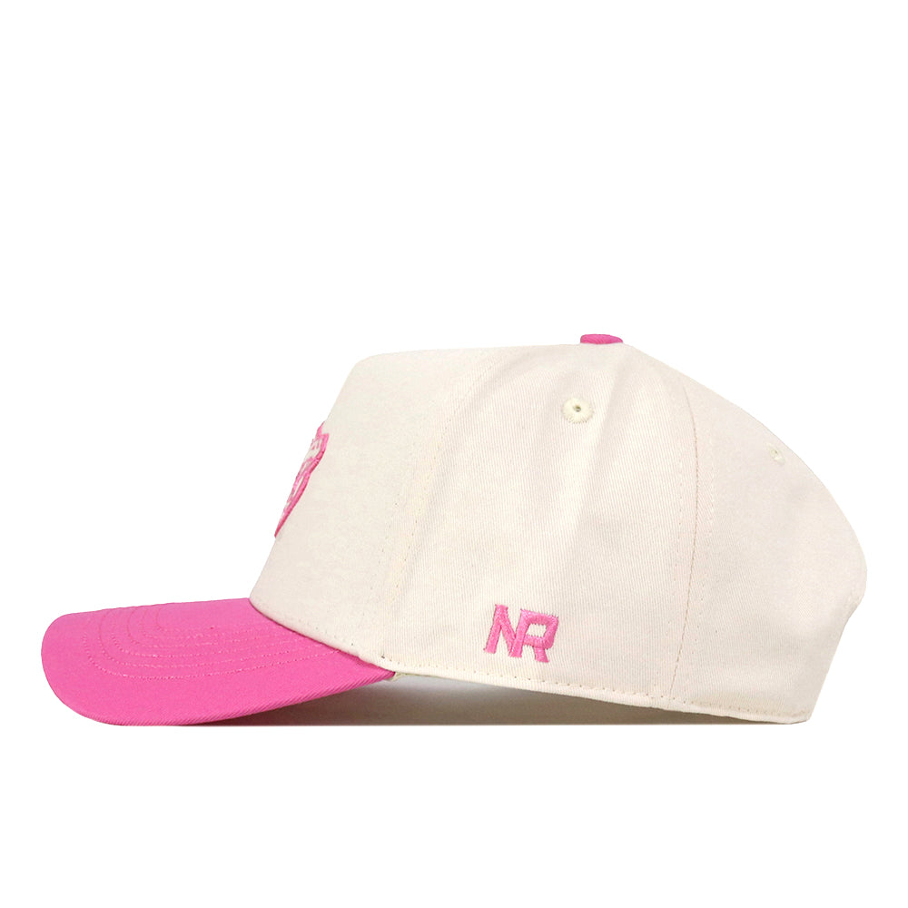 Introducing the Florida Pink Out Hat by No Rivals—a stylish white snapback baseball cap featuring a pink brim and pink NR initials embroidered on the side. Officially licensed, this hat is both supportive and fashionable, perfect for showing your support in the fight against breast cancer.