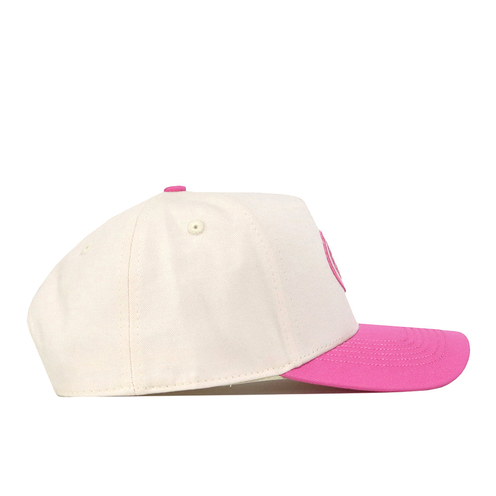 A side view of the No Rivals Florida Pink Out Hat, a snapback baseball cap featuring a white crown, bright pink brim, and matching white button and eyelets. This officially licensed breast cancer hat is displayed against a plain white background.