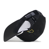 The NDSU Golf Hat - Black by No Rivals is turned inside out, revealing the inner lining, adjustable snap back strap, ventilation holes, and a glimpse of the embroidered logo on the front—perfect details for your ultimate gameday fit.