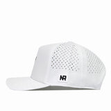 A South Carolina Gamecocks Football Mascot Hat in white by No Rivals, crafted from performance fabric with side ventilation holes and an NR logo patch near the back, featuring a snapback closure, displayed in a side profile against a white background.