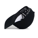 The Texas A&M Night Mode Hat by No Rivals is shown flipped inside out, displaying its inner labels and stitching. The brim faces left, with "NO RIVALS" visible on an interior strip of this black high crown cap.