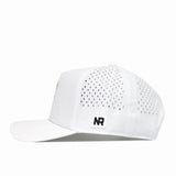 A No Rivals North Carolina Tar Heels Mascot Hat in white, featuring performance fabric with small perforated holes on the back panels and an NR embroidered logo patch on the side. This Snap Back Hat is shown from the left side against a plain white background.