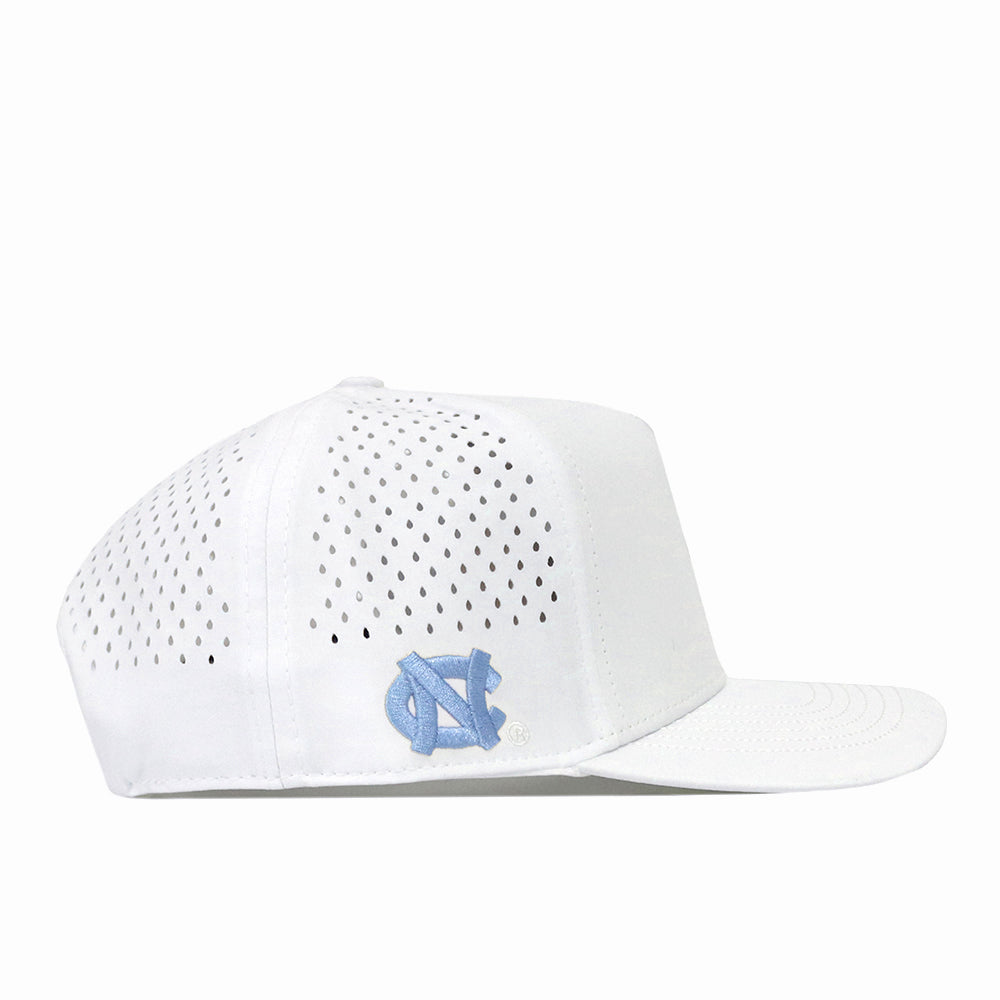 A white North Carolina Tar Heels Mascot Hat by No Rivals, featuring performance fabric with ventilation holes and a light blue interlocking NC embroidered logo on the side, shown on a white background.