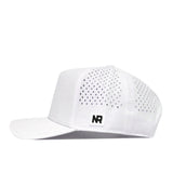 A white Washington Huskies Football Mascot Hat by No Rivals, featuring a flat brim, side panel perforations for ventilation, an adjustable snap back closure, and an NR embroidered logo patch on the side.