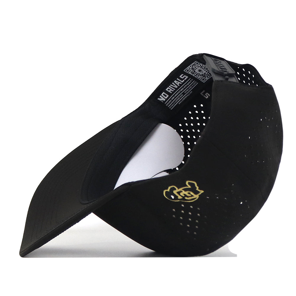 A black Colorado Football Hat by No Rivals, flipped upside down to display its perforated snapback, curved brim, and a gold embroidered logo on the side—an essential accessory for your gameday fit.