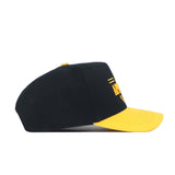 The No Rivals App State Tailgate Hat - 2 is a black snapback with a curved yellow brim, side view, featuring embroidered logos and yellow front text—ideal for upgrading your gameday look.