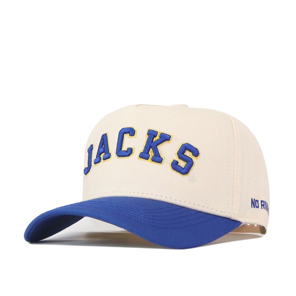 Show your South Dakota State Jackrabbits pride with the Right Side Up Jacks Hat - Classic by No Rivals. This beige snapback features “JACKS” embroidered in bold blue and yellow lettering on the front, complemented by a curved blue brim. An adjustable closure offers a customizable fit, while the partially visible “NO RIN”—a signature of No Rivals—adds unique style to this must-have accessory.