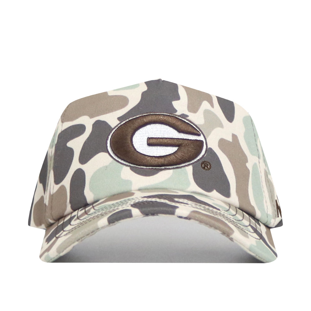Introducing the No Rivals Georgia Bulldogs Huntsman Hat: a high-quality cotton camouflage snapback featuring a large, brown-outlined embroidered “G” on the front center. This structured cap’s standout style is enhanced by its contrasting white background.