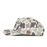 A side view of the Georgia Bulldogs Huntsman Hat by No Rivals, showcasing a camouflage-patterned baseball cap made from high quality cotton with brown, green, and beige splotches. The hat features the letters NR embroidered on the side and offers a structured fit with an adjustable snap back closure for comfort and security.