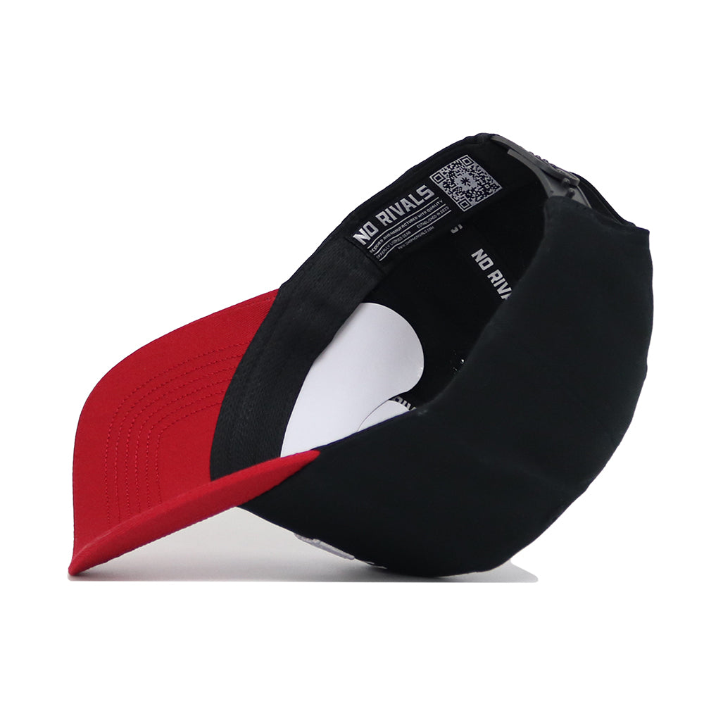 The Arkansas Tailgate Hat by No Rivals is a two-tone snapback with a red brim, black crown, and high-quality cotton. Shown upside down, it reveals the "NO RIVALS" text on the sweatband and its structured interior lining.