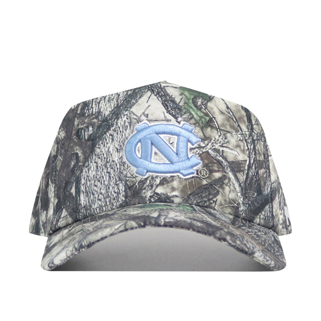 The No Rivals North Carolina (UNC) Outland Hat is a high-quality cotton camo snapback featuring a light blue interlocking NC logo on the front and a structured fit for lasting comfort.