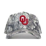 The No Rivals Oklahoma Outland Hat is a structured-fit camouflage baseball cap made from high-quality cotton, featuring a bold red OU logo embroidered on the front, shown from the front against a white background.
