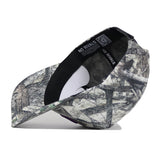 The LSU Outland Hat by No Rivals is a camo-pattern baseball cap with a structured fit, curved bill, black inner sweatband featuring "NO RIVALS" in white, and is crafted from high-quality cotton for comfort.