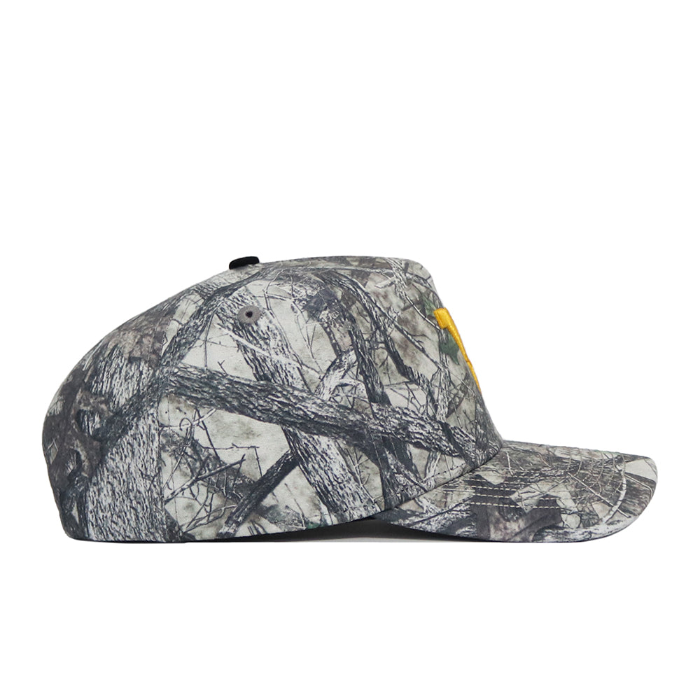 Side view of the No Rivals West Virginia Outland Hat, featuring a gray and black camo snapback design with a yellow logo on the front, made from high quality cotton and shown against a white background.