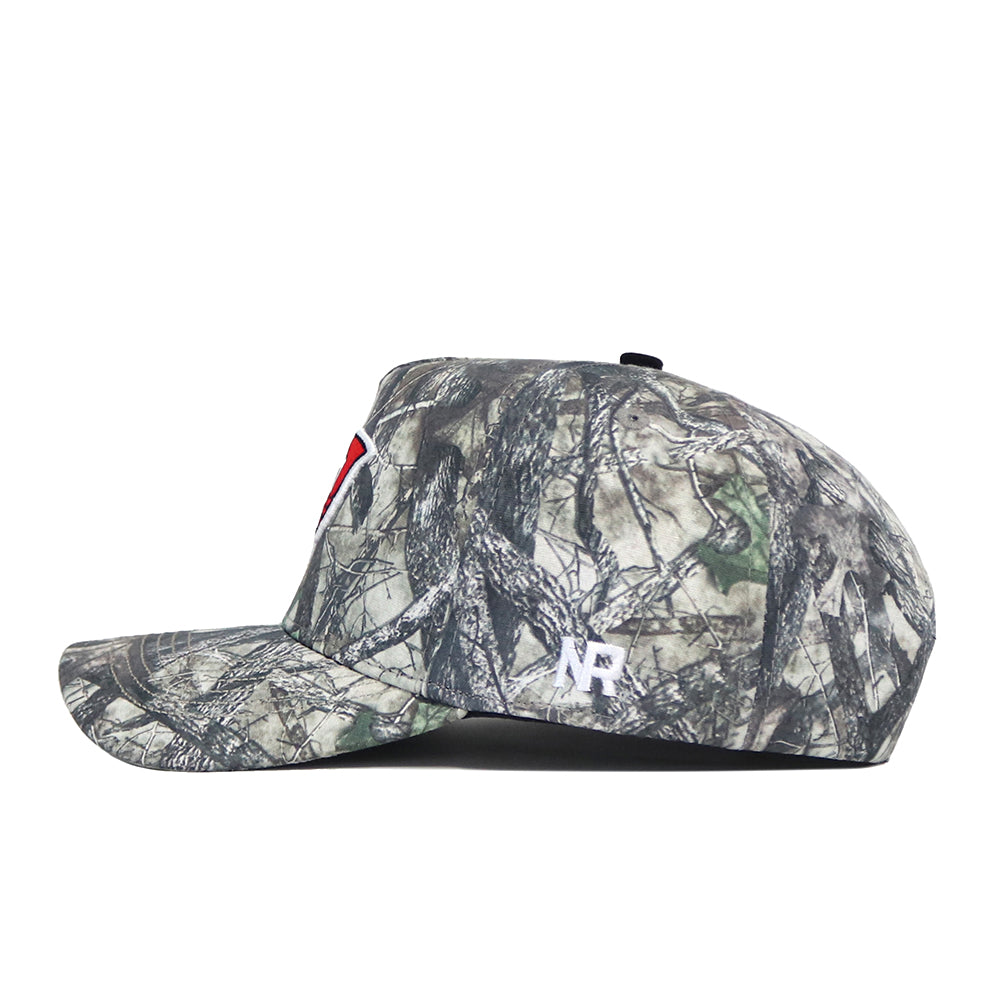 The No Rivals Western Kentucky Outland Hat is shown from the side, featuring a camouflage pattern, a structured fit, high-quality cotton construction, and a white embroidered “R” logo on the back panel for standout style.