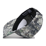 The Western Kentucky Outland Hat by No Rivals, crafted from high quality cotton, features a camouflage pattern and structured fit. Shown on its side, it reveals an inner band with NO RIVALS print and a QR code at the back.