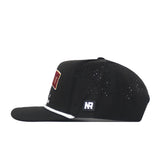Side view of the Minnesota Gophers Golf Hat in black by No Rivals, featuring perforated holes on the back half, a flat brim, and a small embroidered NR logo patch above the brim. This officially licensed snapback also includes a partially visible red and gold rectangular patch on the front.