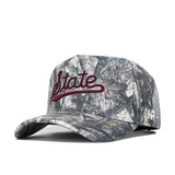 The No Rivals Mississippi State Outland Hat is a high-quality cotton camo snapback with "State" embroidered in red and white script on the front and a small white N P logo on the side.