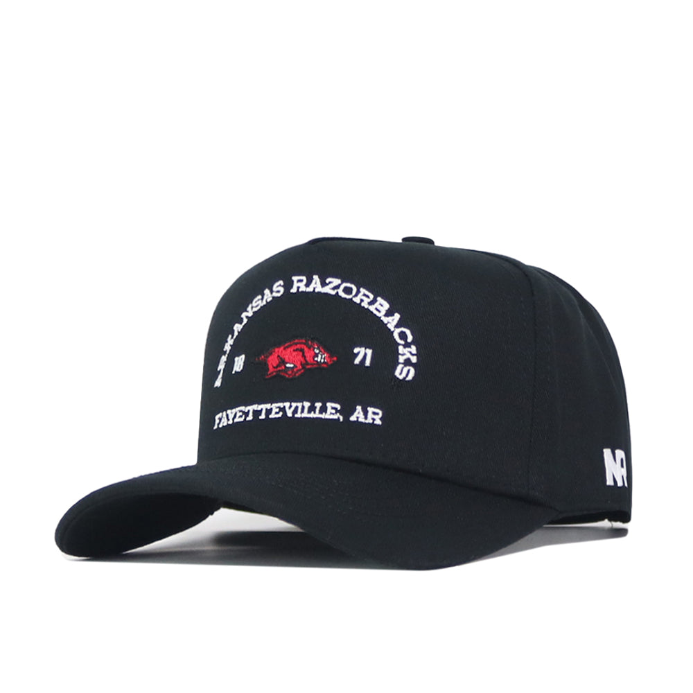 Introducing the Arkansas Outlaw Hat - Black by No Rivals: This black baseball cap features an embroidered logo with “Arkansas Razorbacks, 1871, Fayetteville, AR” alongside a bold red hog on the front. The side of the cap displays the “NR” initials for No Rivals. Designed for a flawless gameday fit, it comes with a snap back closure that ensures all-day comfort.