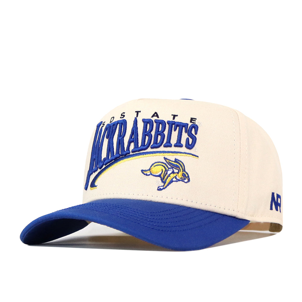 Show off your team pride with the No Rivals South Dakota State Jackrabbits Stride Hat—a white and blue snapback featuring “Jackrabbits” and a running rabbit logo embroidered on the front, plus “SDSTATE” above the main text. The perfect finishing touch to your gameday outfit!.