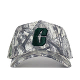The Charlotte Outland Hat by No Rivals is a camouflage baseball cap featuring a prominent green embroidered C logo on the front and an adjustable snap back for the perfect gameday fit.