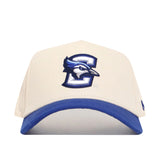 The No Rivals Creighton Logo Patch Hat is a white and blue snapback featuring a bold 3D-embroidered blue jay head inside a large C on the front plus a blue visor, all in a stylish cotton blend.
