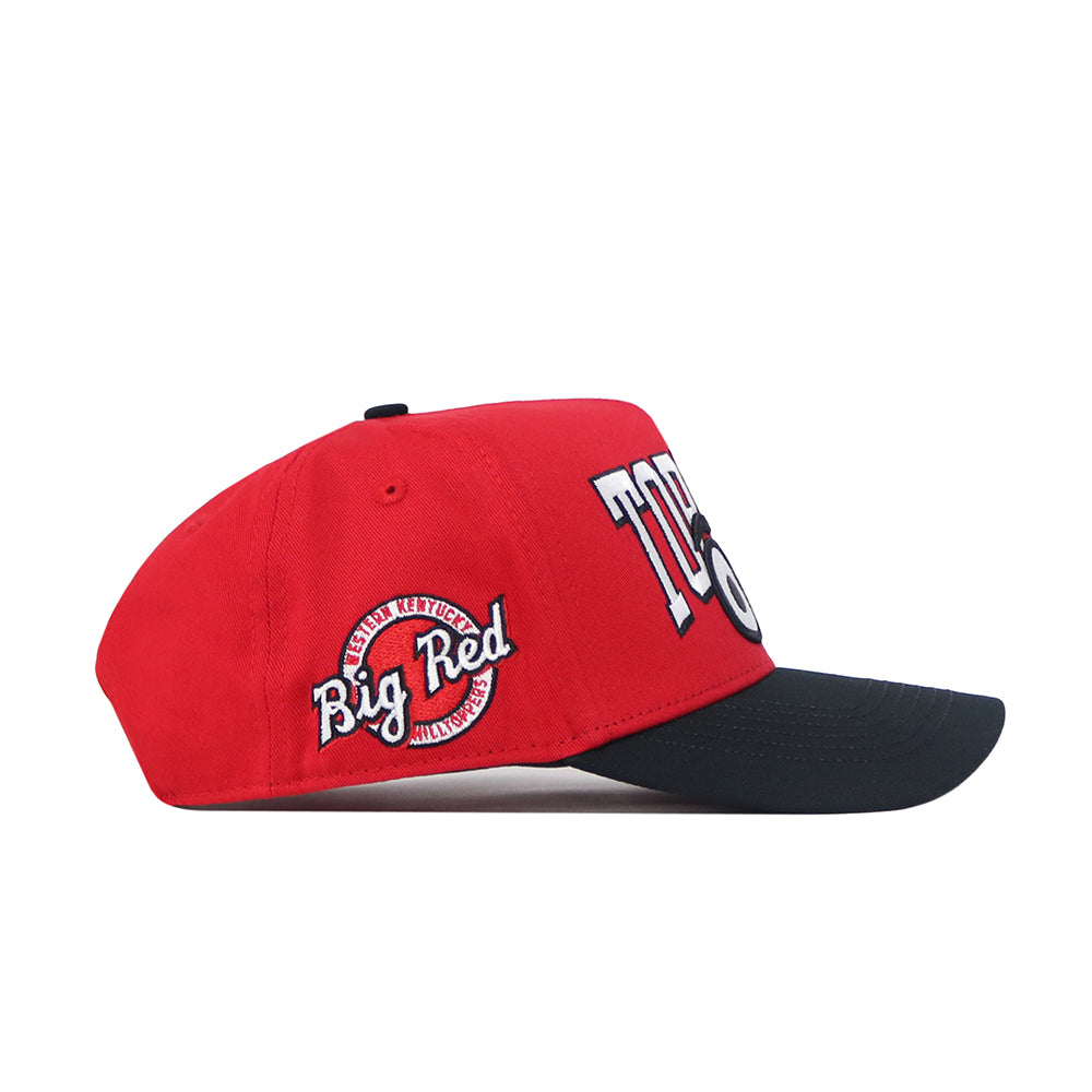 The No Rivals WKU Toppers Big Red Eyes Hat is a red and black snapback featuring "TOPS" in bold white letters on the front, “Big Red” with a circle logo embroidered on the side, and a structured cotton fit with black brim and button top.