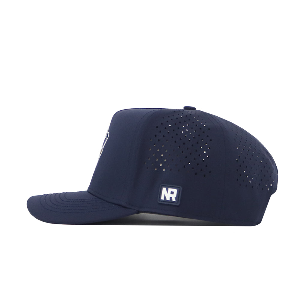 The No Rivals ETSU Golfing Buc Hat in navy features a snapback design, flat brim, side ventilation holes, and a small rectangular NR logo patch on the side.