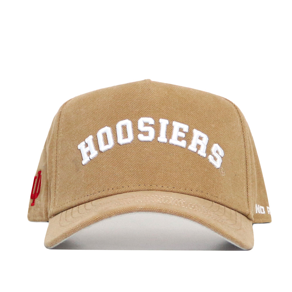 The Indiana Rustic Hat by No Rivals is a tan cotton canvas snapback with a structured fit, "HOOSIERS" embroidered in white on the front, and a red logo on the side—perfectly showcased against a plain white background.