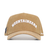 The No Rivals West Virginia Rustic Hat is a tan cotton canvas cap with "MOUNTAINEERS" embroidered in white on the front and blue side embroidery. It’s adjustable for a classic, sporty look.