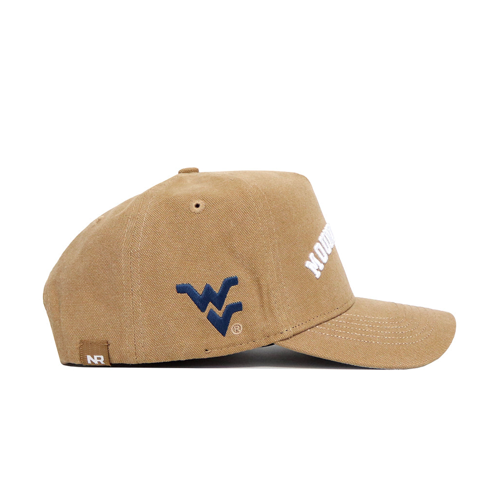The West Virginia Rustic Hat by No Rivals is a tan cotton canvas cap with a curved brim, blue WV logo on the side, white Mountaineers text on the front, and an NR tag near the adjustable strap for a comfortable fit.