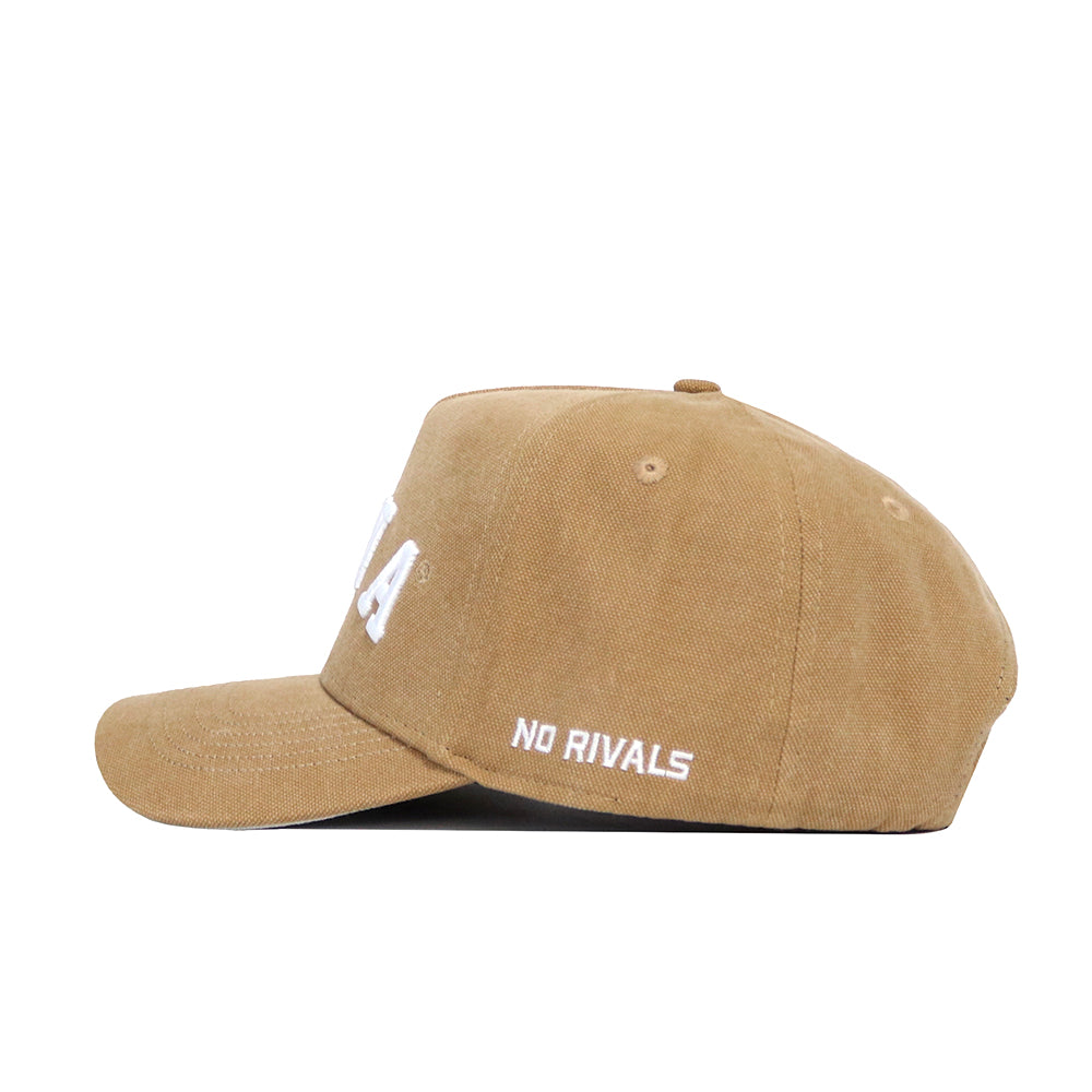 The Iowa Rustic Hat by No Rivals is a tan cotton canvas baseball cap with "NO RIVALS" white embroidery on the side and a classic snapback for adjustable fit, shown in side profile against a white background.