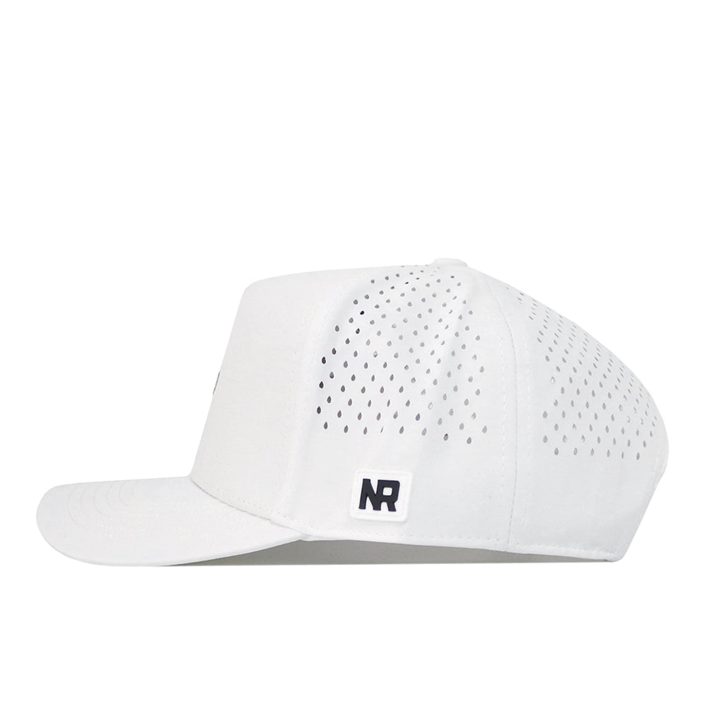 A Montana State Football Hat in white by No Rivals features small ventilation holes on the side and back panels, along with a rectangular NR patch above the brim on the left side that complements its classic snapback design—making it the perfect addition to your gameday fit. The background is white.