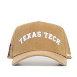 The Texas Tech Rustic Hat by No Rivals is a tan cotton canvas hat with a structured fit, featuring "TEXAS TECH" embroidered in white on the front and a small red and black logo on the left side.
