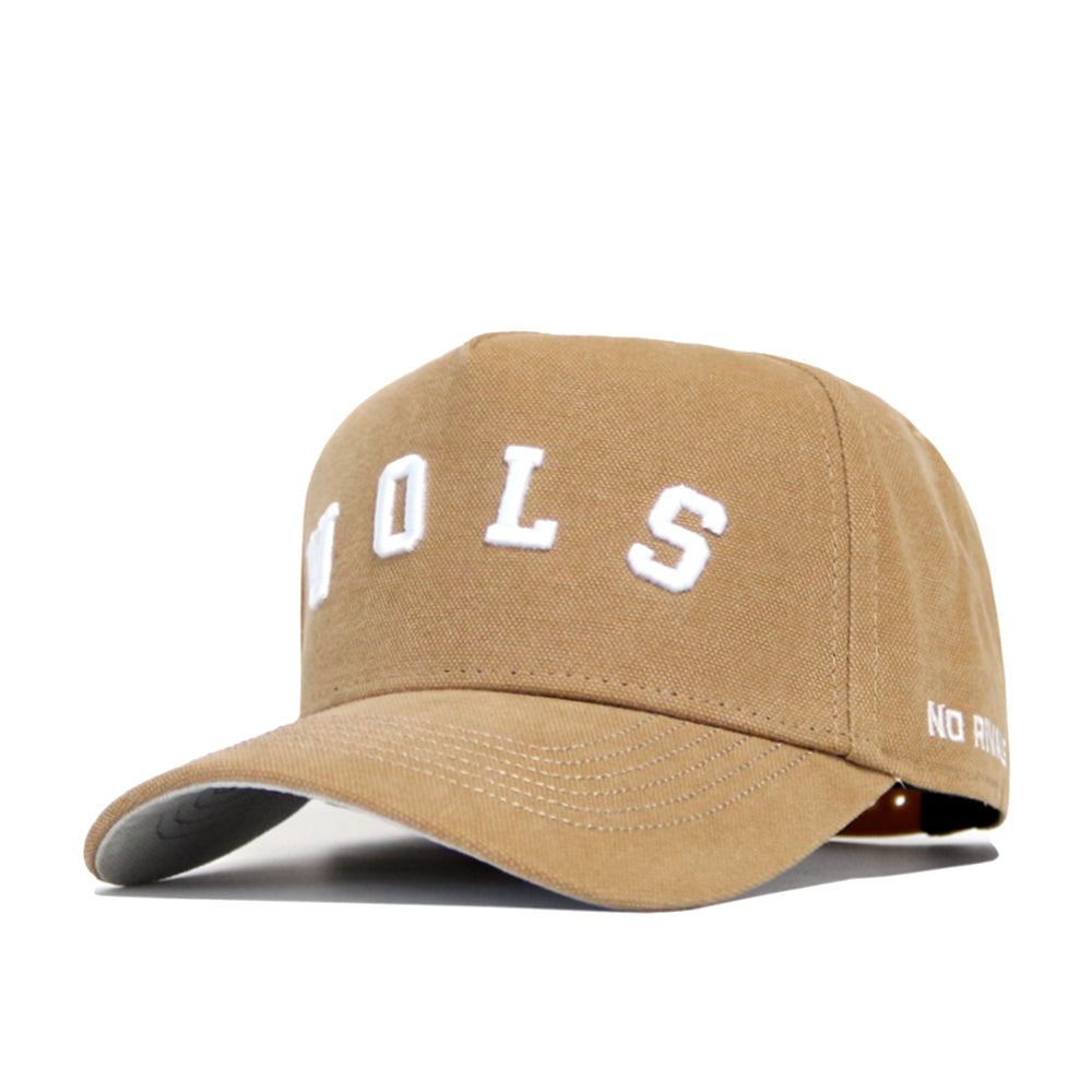 The Tennessee Rustic Hat by No Rivals is a tan baseball cap with white embroidered 'NOLS' on the front and 'NO' partially visible on the left brim, shown here in a structured fit against a white background.