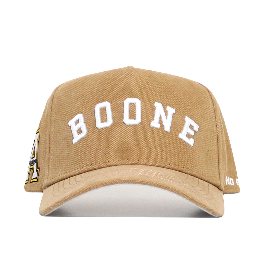 The No Rivals App State Rustic Hat is a tan cotton canvas baseball cap with "BOONE" embroidered in large white letters on the front, extra embroidery on the left side, and an adjustable snap back for a comfortable fit.