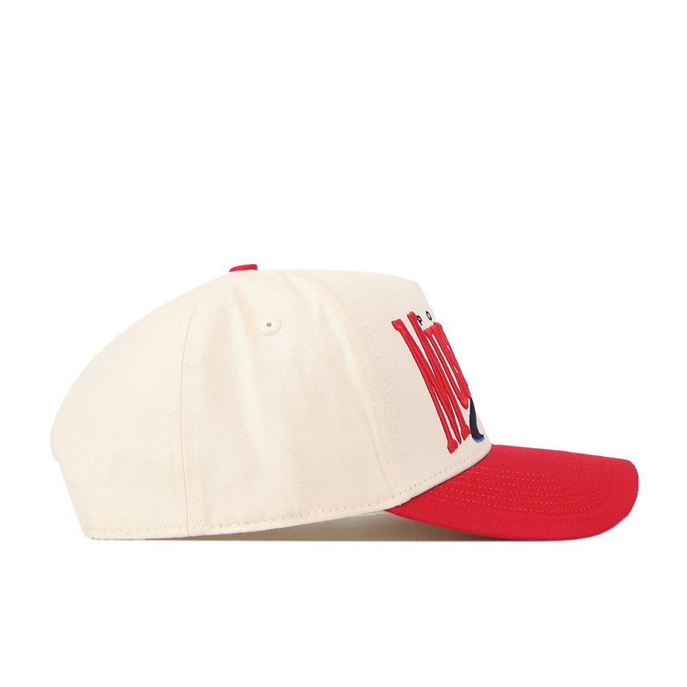 The No Rivals SMU Mustangs Stride Hat features a cream-colored snapback design with a red brim and prominent red and black embroidered logos on the front, shown from the side.