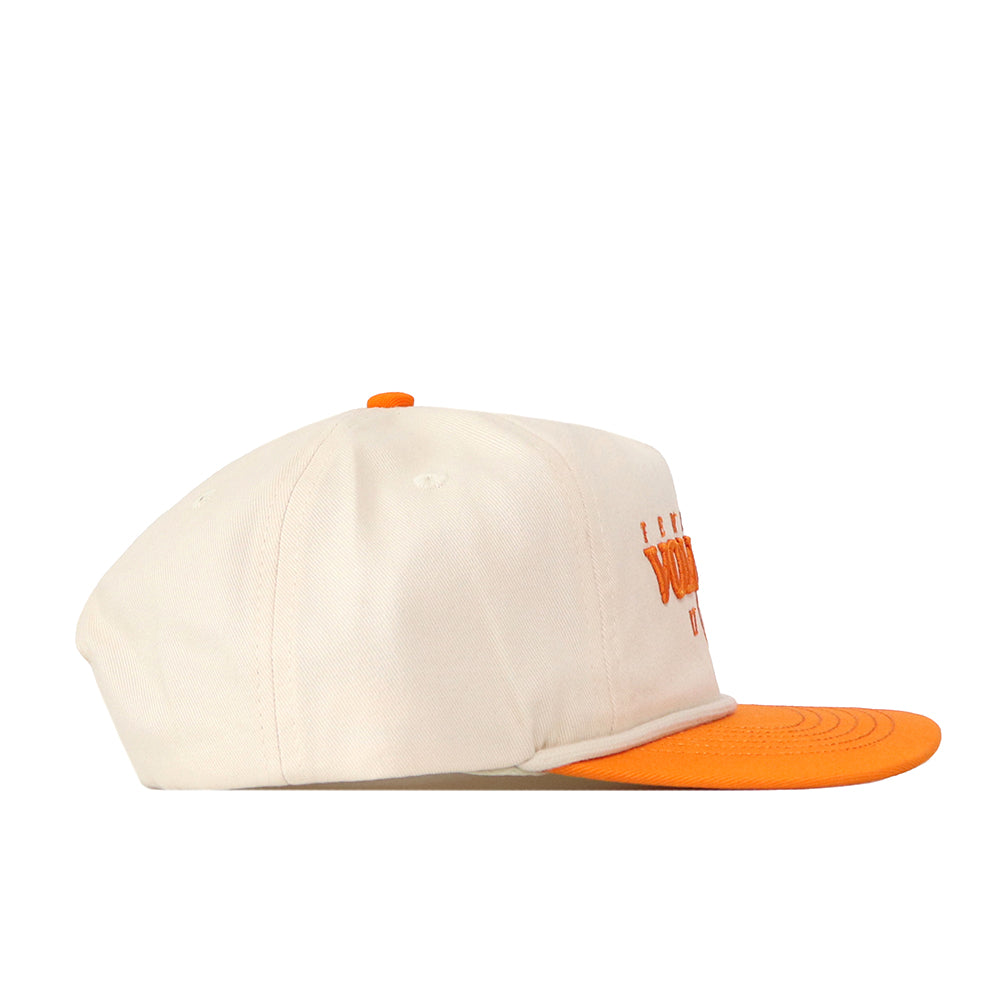 The No Rivals Tennessee Starter Hat is a cream-colored snapback baseball cap featuring an orange brim, an orange button on top, and orange embroidered text on the front, shown here in a side profile view.