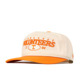 The Tennessee Starter Hat by No Rivals is a cream and orange baseball cap, featuring an officially licensed “Tennessee Volunteers 1794” embroidered logo in orange on the front and an orange brim, with a convenient snap back for an adjustable fit.