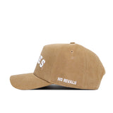 A side view of the Virginia Tech Rustic Hat by No Rivals, made from brown cotton canvas with "NO RIVALS" embroidered in white by the brim, visible stitching, ventilation eyelets on the crown, and a snapback closure.