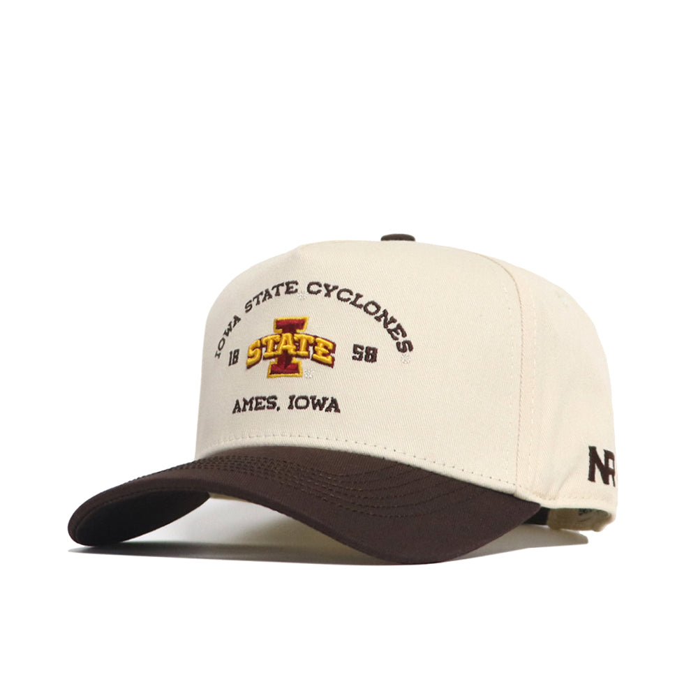 The No Rivals Iowa State Outlaw Hat - Classic features a beige and brown snapback with an embroidered red and gold I State logo and "Ames, Iowa" on the front, plus a contrasting dark brown brim. Officially licensed Cyclones gear.